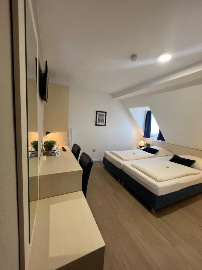 Hotel Pelikan Китцинген Екстериор снимка